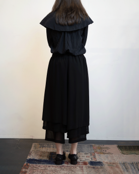 pantalon noir plissé