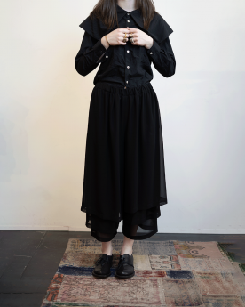 pantalon noir plissé